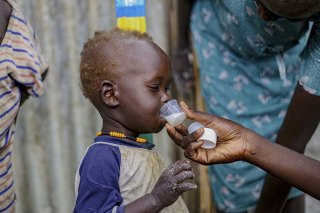 A kid receiving care