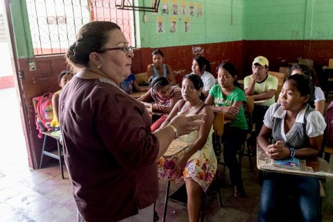 Teacher with students in classroom