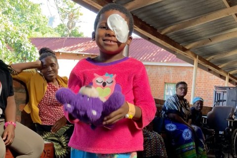 Little girl with an eye patch